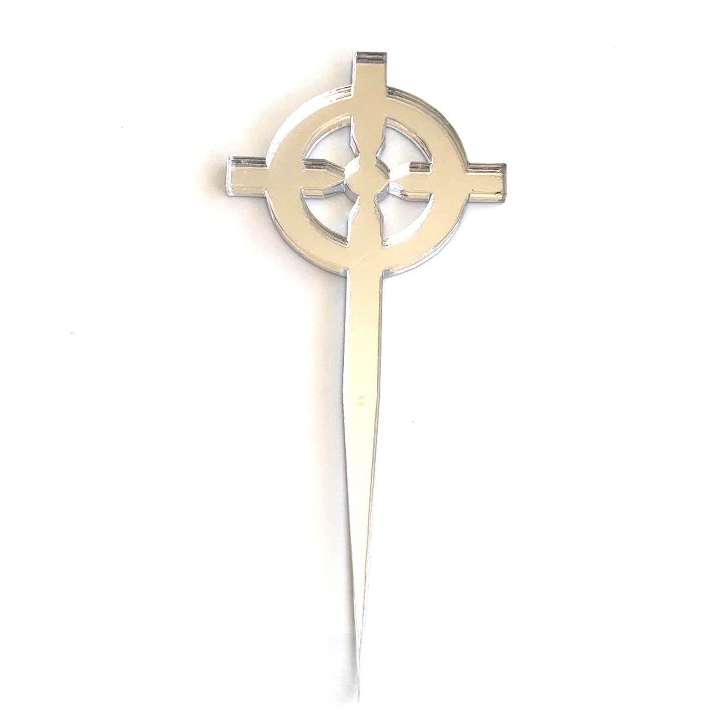 Silver mirror-finish Celtic cross cupcake topper with a pointed stake base, isolated on a white background.