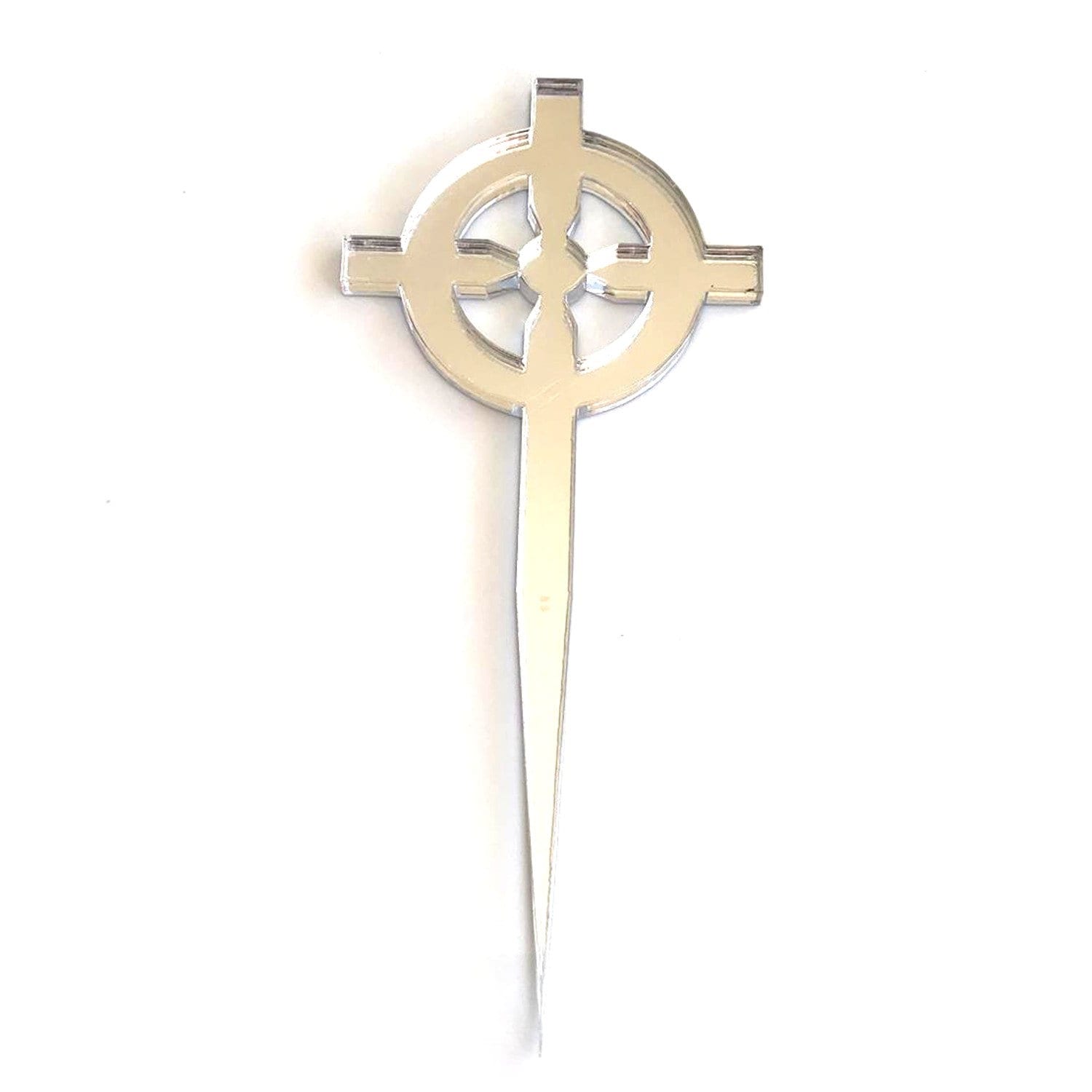 Silver mirror-finish Celtic cross cupcake topper with a pointed stake base, isolated on a white background.