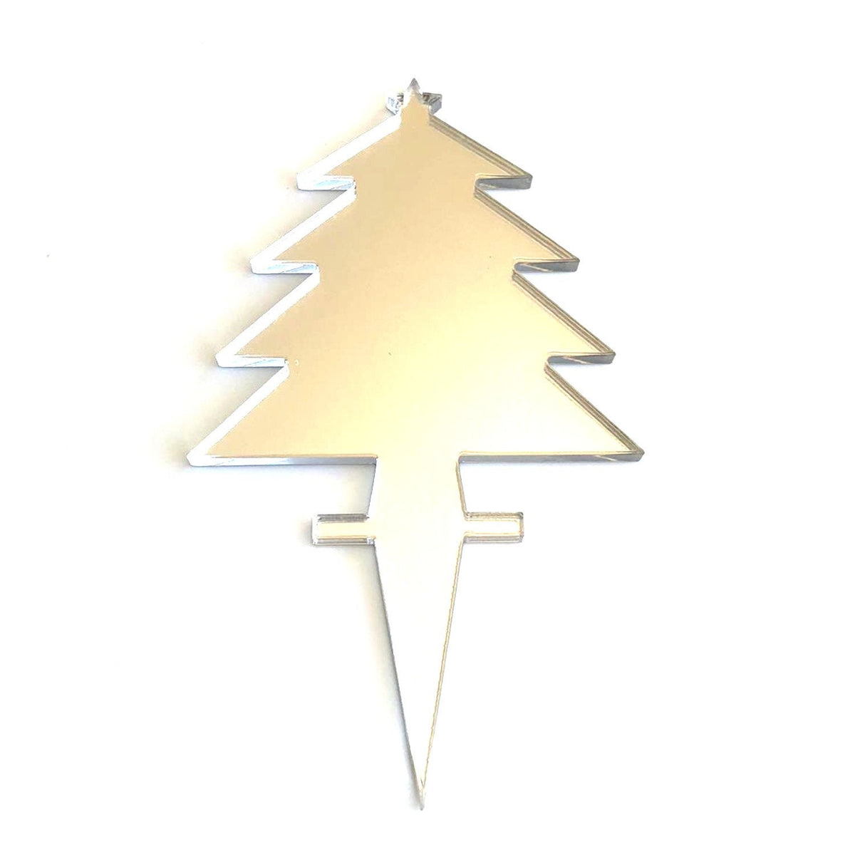 Reflective, silver-toned recycled acrylic Christmas tree cupcake topper with a pointed base stake.