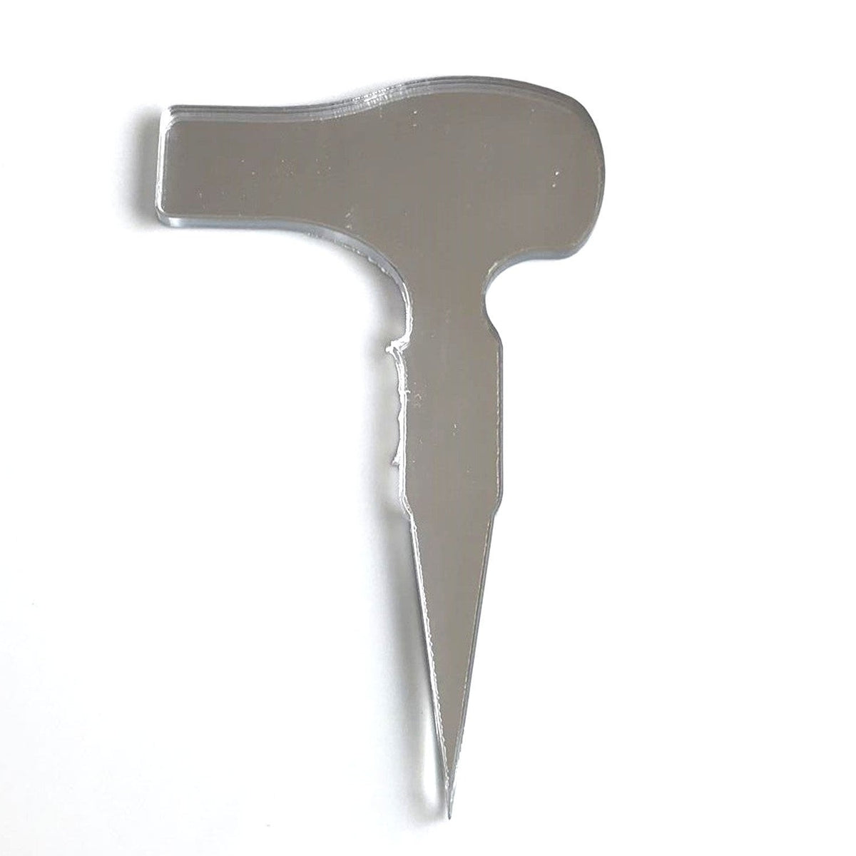 Mirror-finish silver acrylic hairdryer-shaped cake topper by SuperCoolCreations against a white background.