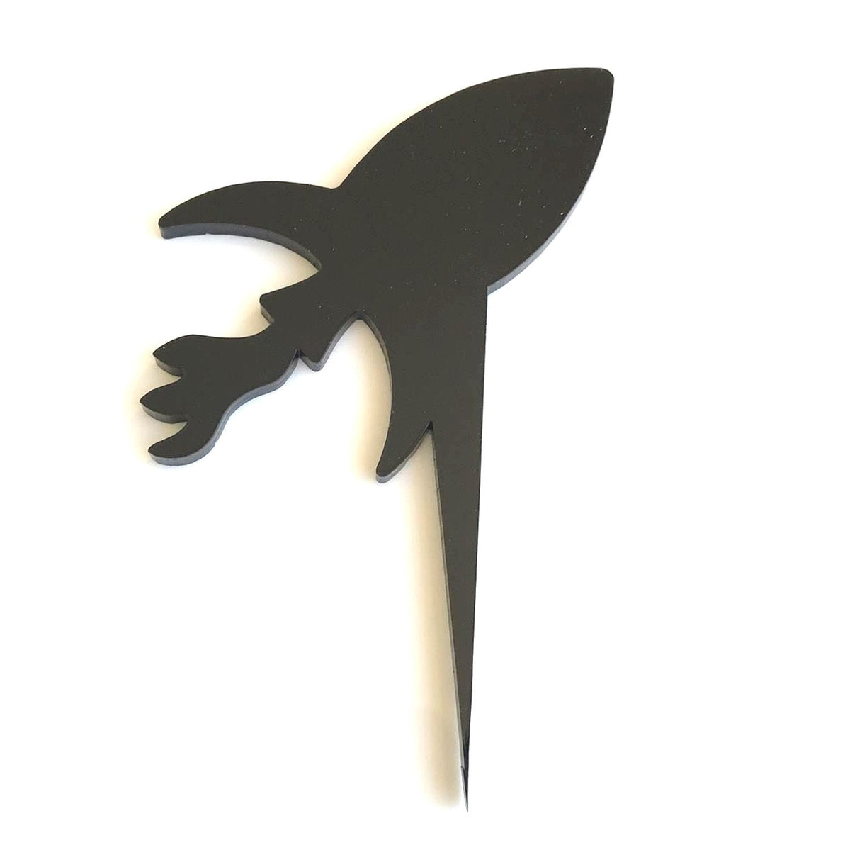 Black rocket-shaped cake topper with exhaust flame tail, made of smooth acrylic for space-themed party decor.