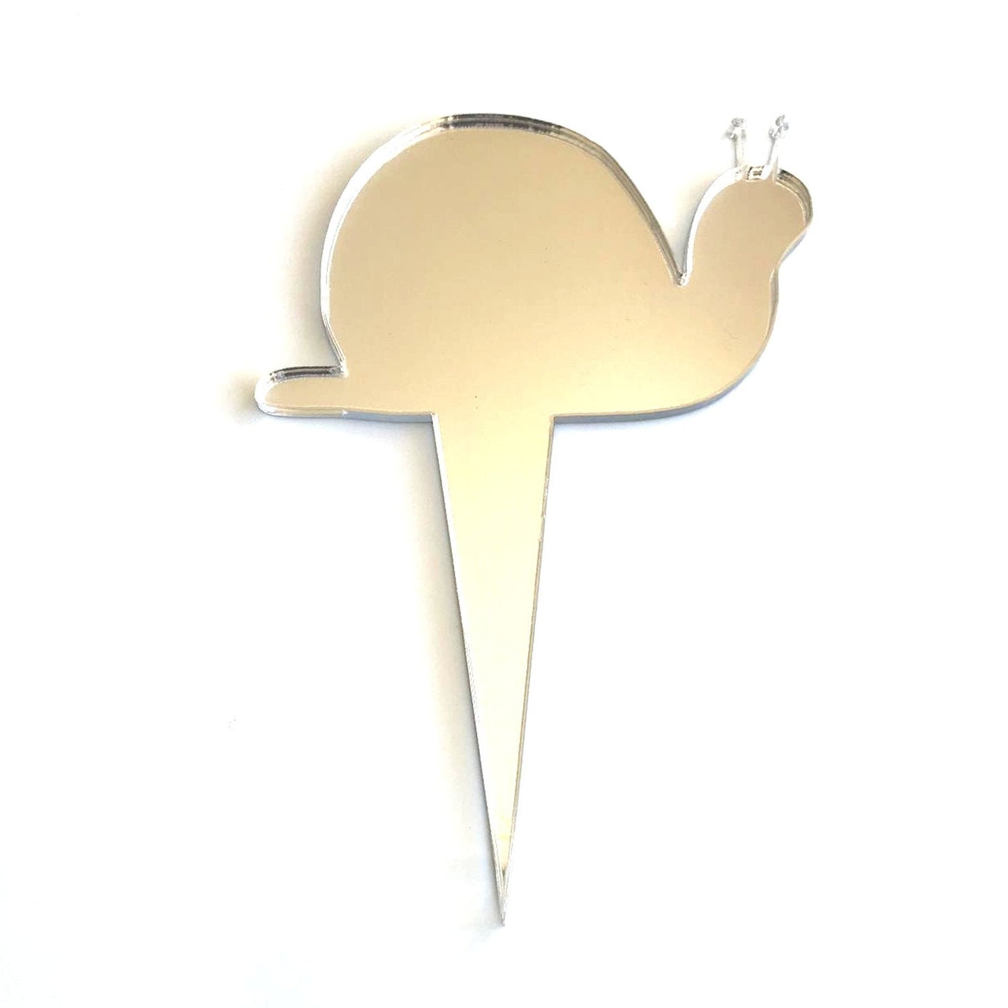 A reflective, mirrored snail-shaped cupcake topper made of recycled acrylic, featuring a sharp stake base.