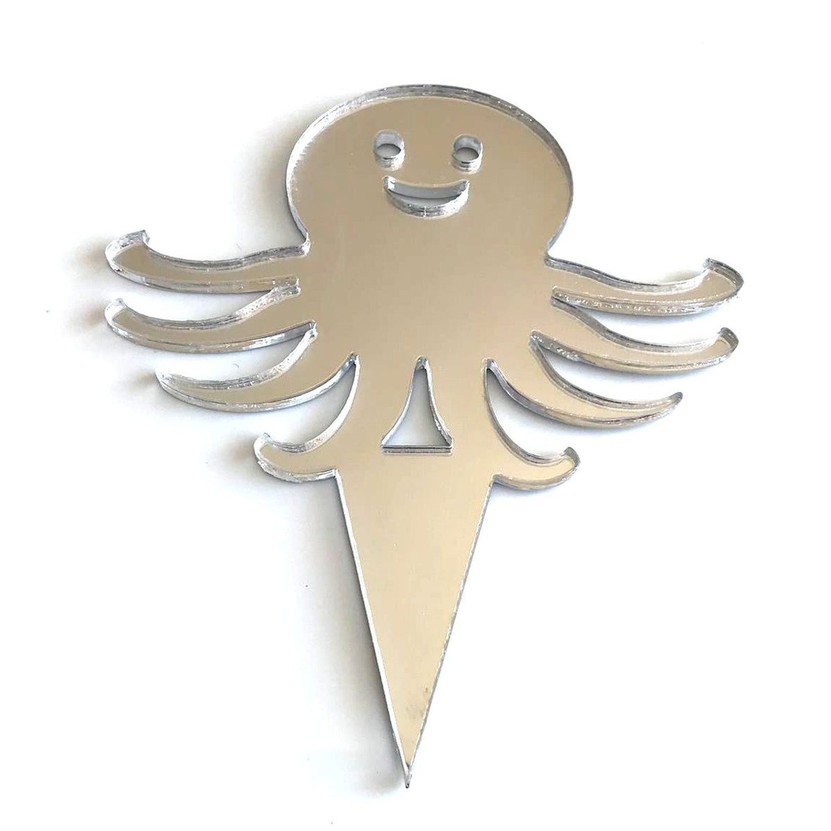 Shiny, mirror-finish acrylic octopus cake topper with a smiling face and a pointed base for inserting into a cake.