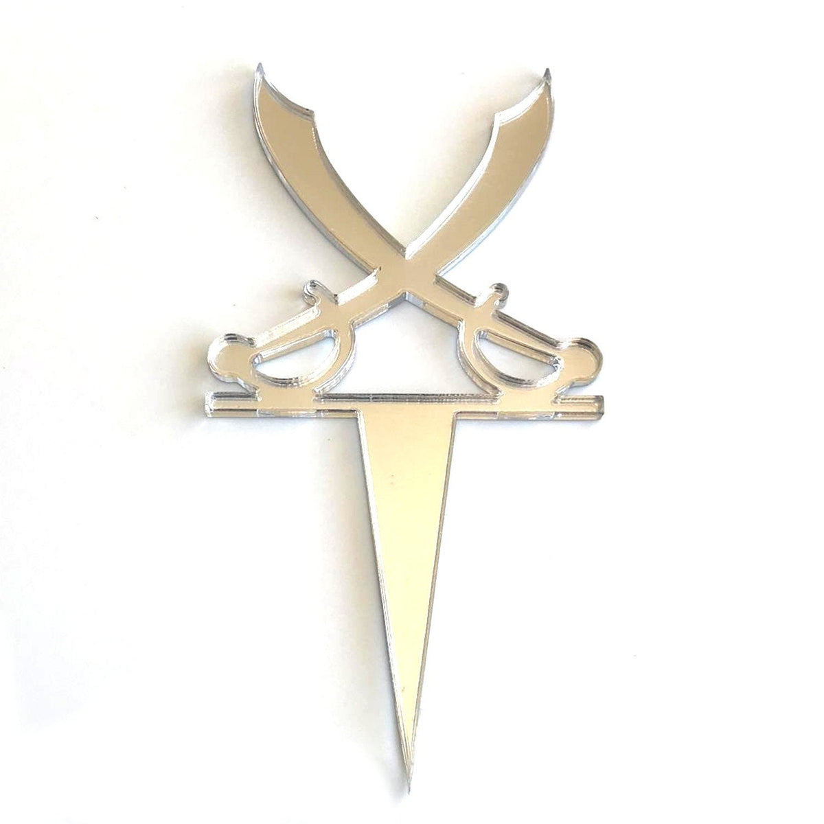 A mirrored silver, recycled acrylic pirate sword cake topper shaped like two crossed cutlasses with a spike base.