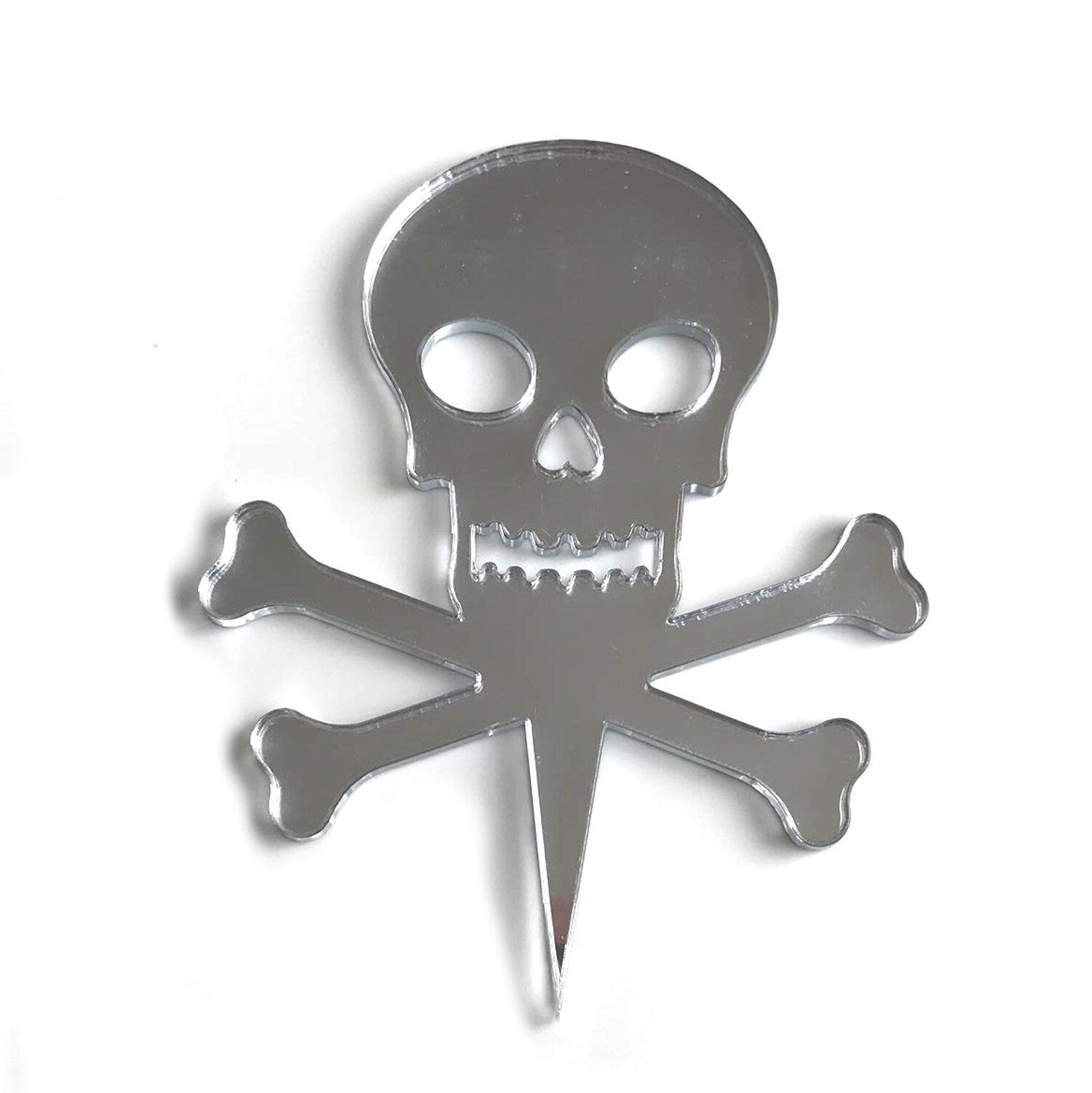 Silver mirror-finish recycled acrylic skull and crossbones cake topper on a white background.