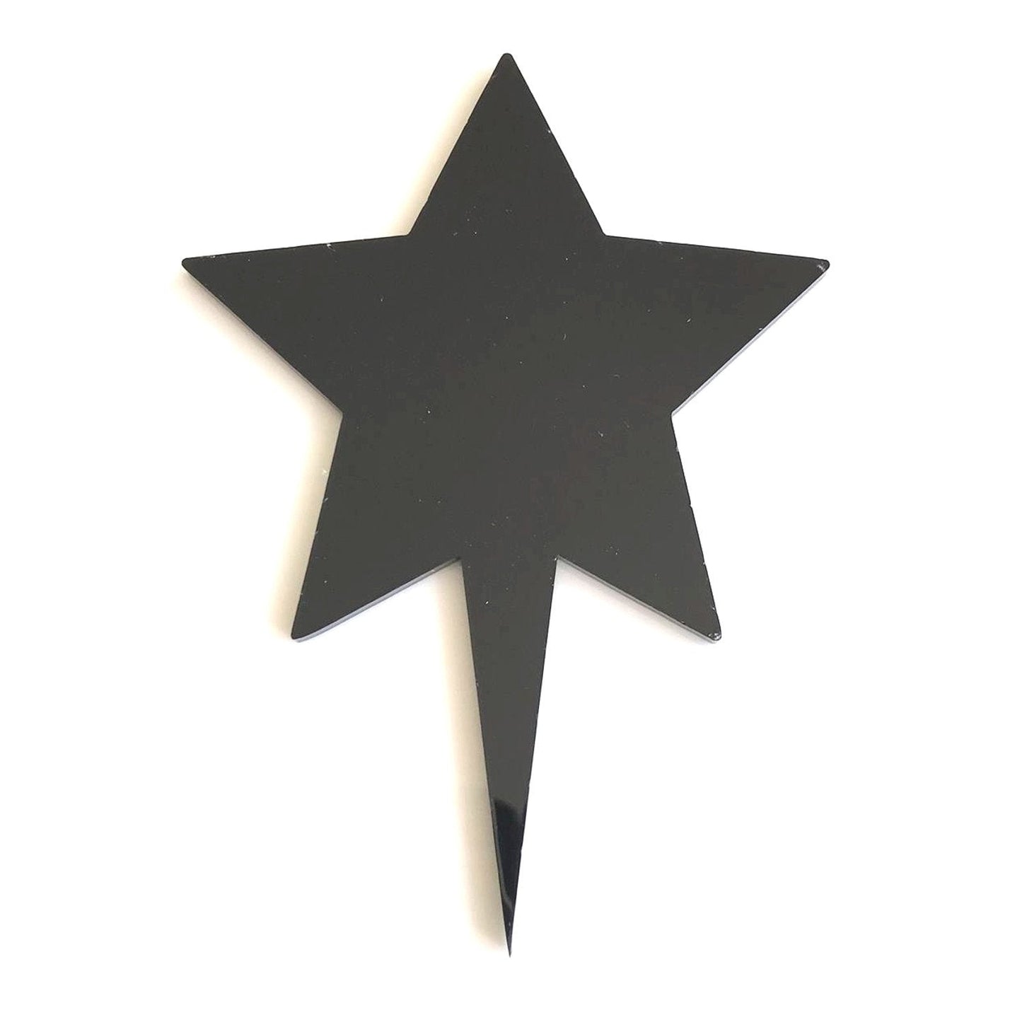 Glossy black star-shaped cake topper with a single pointed base, isolated on a white background.