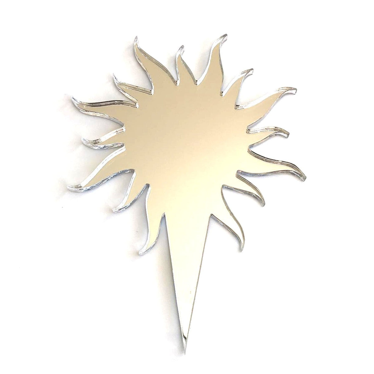 A reflective, silver, laser-cut sun-shaped cake topper with a sharp pointed base on a plain white background.