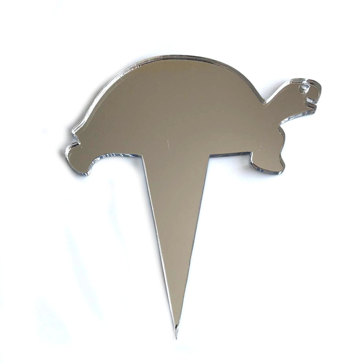 Silver mirrored acrylic tortoise cake topper shaped like a turtle with a sharp stake for insertion.