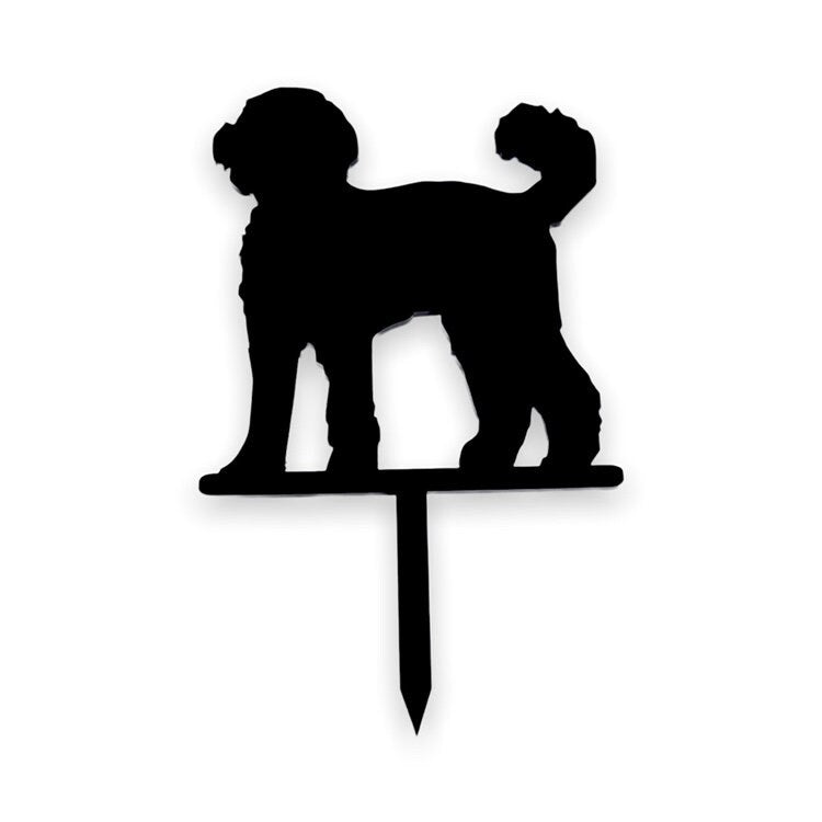 Black acrylic cake topper featuring a Cockapoo dog silhouette standing on a base with a single pointed spike.