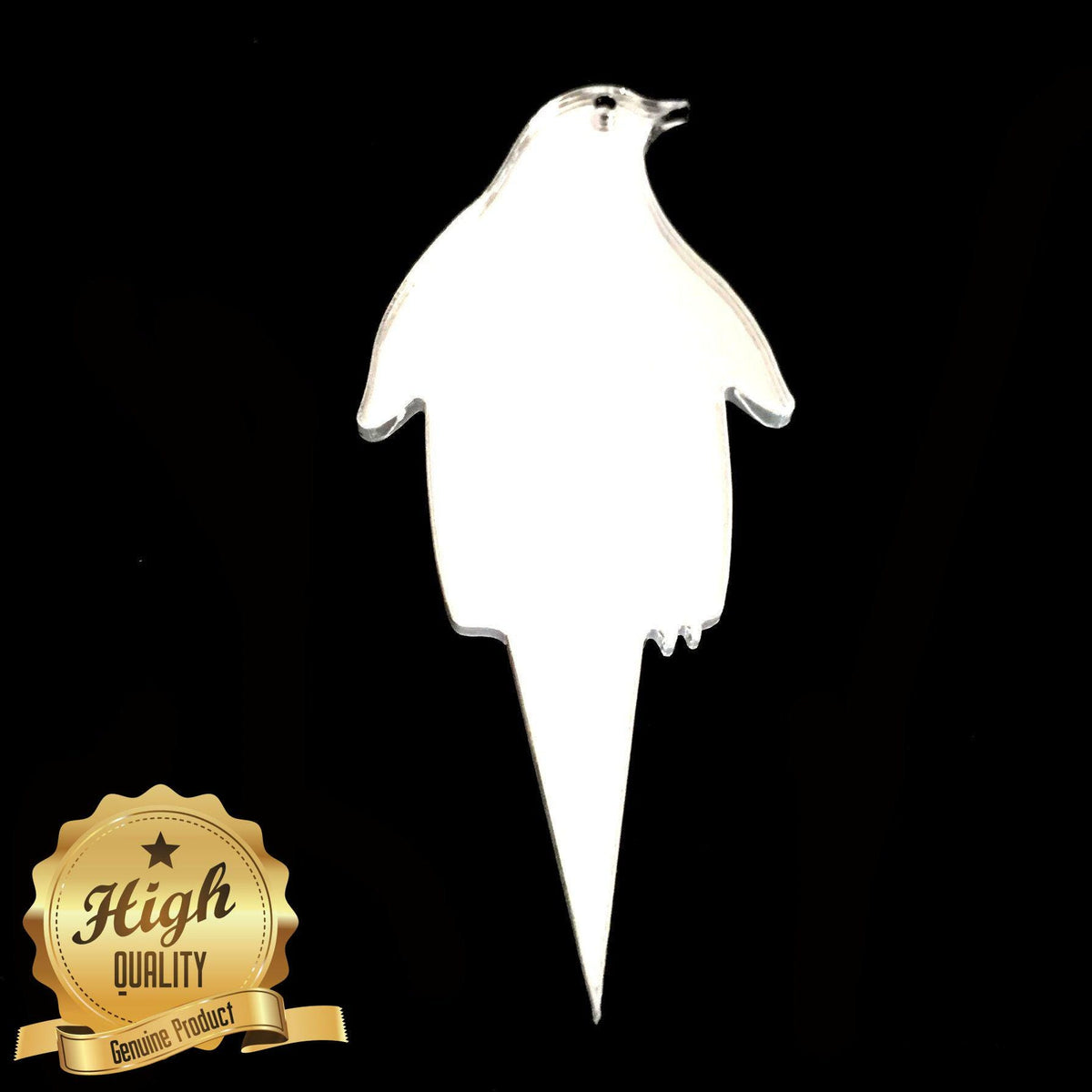 A translucent white, penguin-shaped acrylic cake topper on a black background with a gold "High Quality" badge.