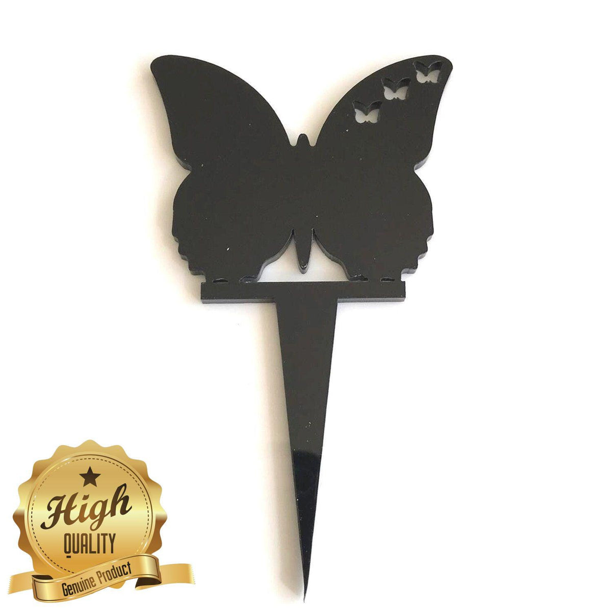 Black acrylic butterfly cupcake topper with three small butterfly cutouts and a pointed stake base.