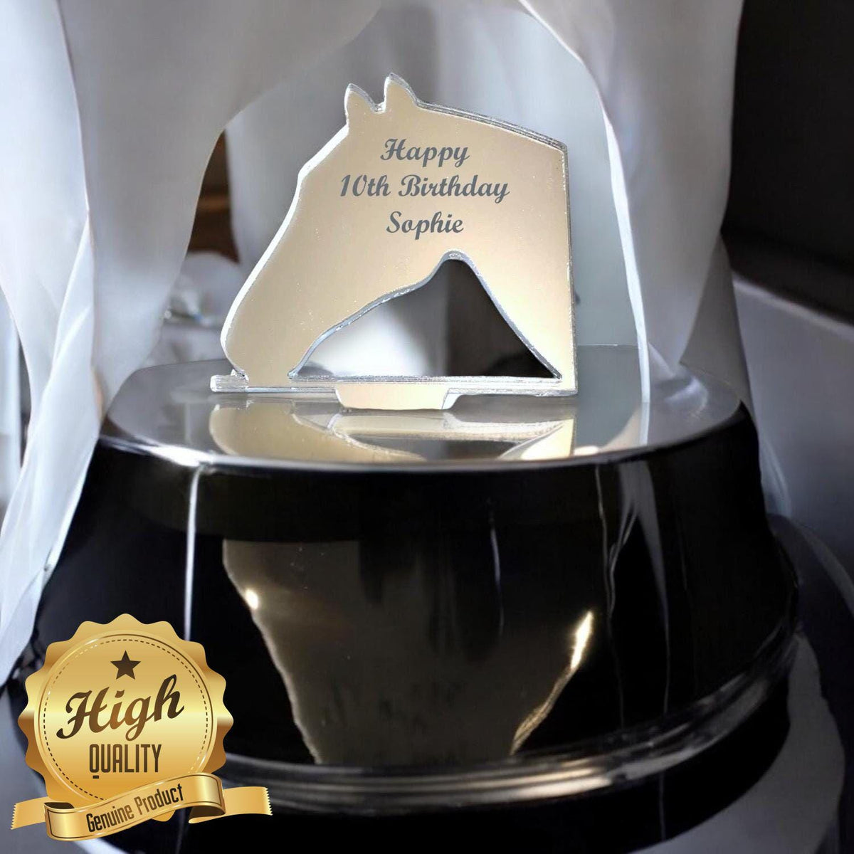 Mirror-finish silver acrylic horse head cake topper engraved with "Happy 10th Birthday Sophie."