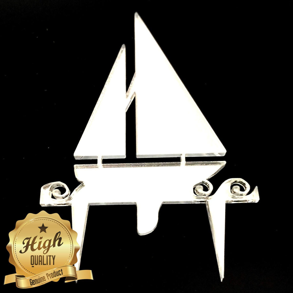 Clear acrylic sailboat cake topper with stylized waves, featuring a "High Quality" gold seal in the corner.