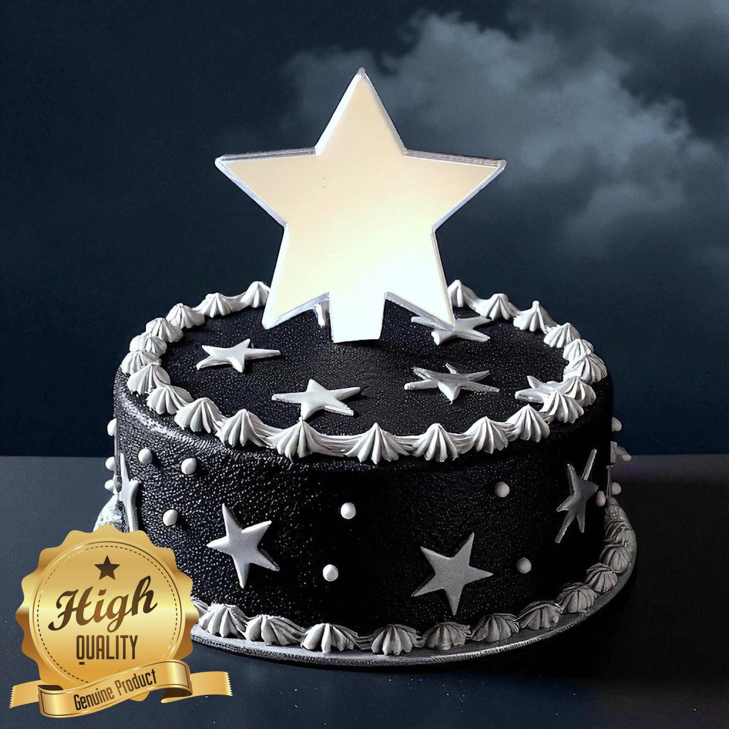 Shiny silver mirror-finish star cake topper atop a round black cake decorated with silver stars and piping.