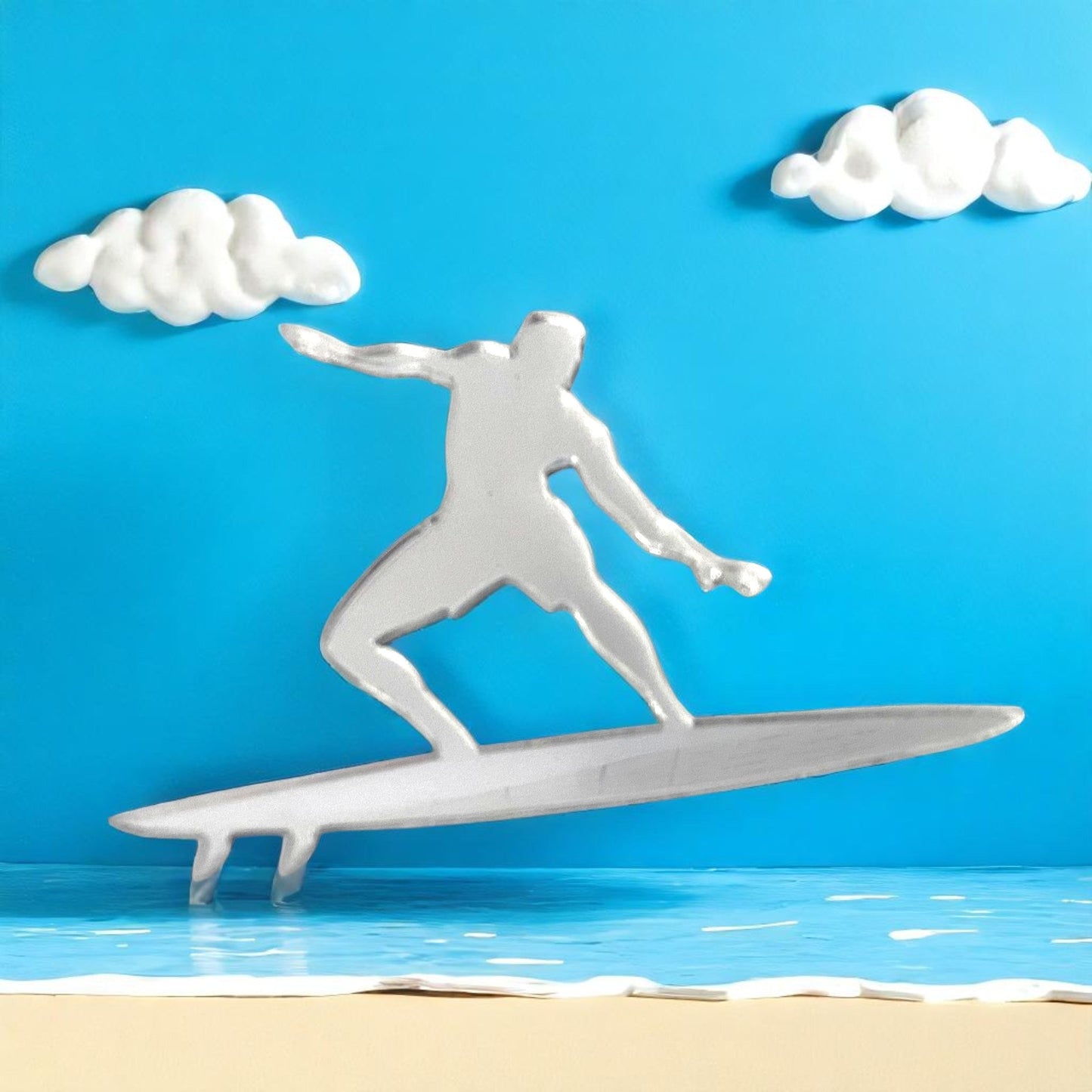 Surfer Mirror in the shape of a silver surfer riding a surfboard against a blue background with clouds.