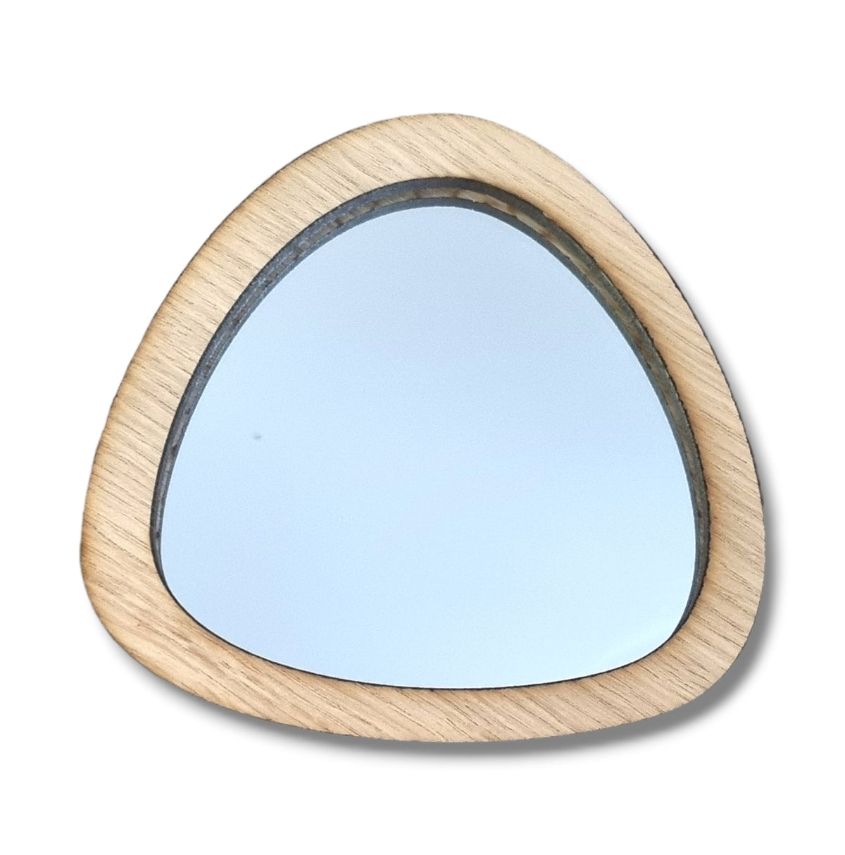 Pebble-shaped mirror with a light wood grain frame against a white background.