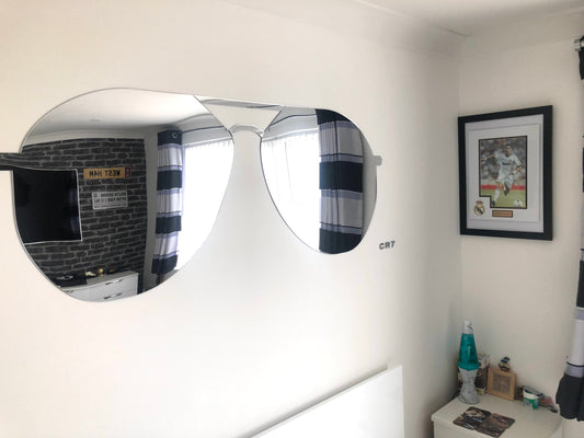 Miroirs en forme de lunettes de soleil